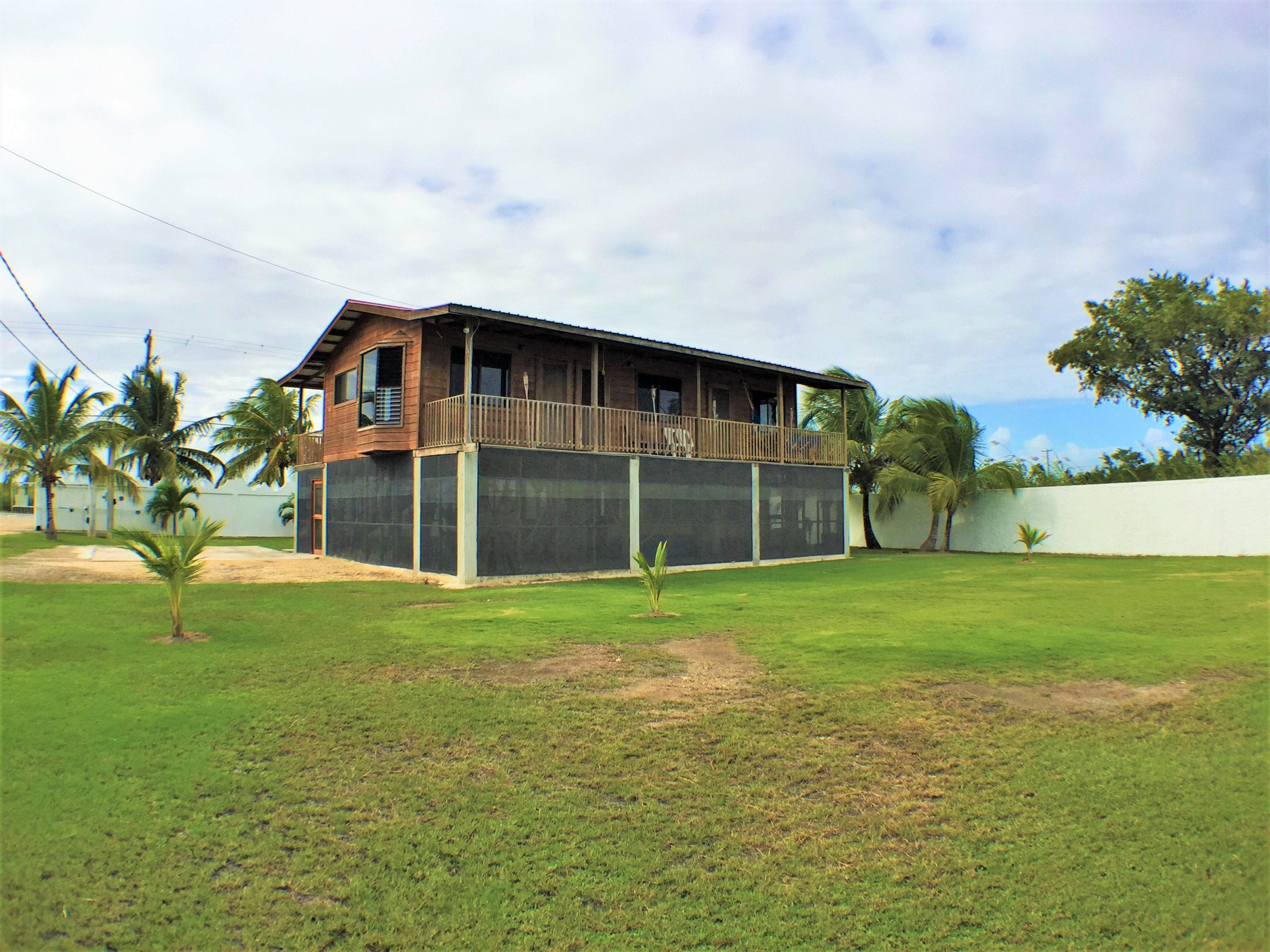 Century 21 Belize Real Estate Lagoon View Home with Swimming Pool